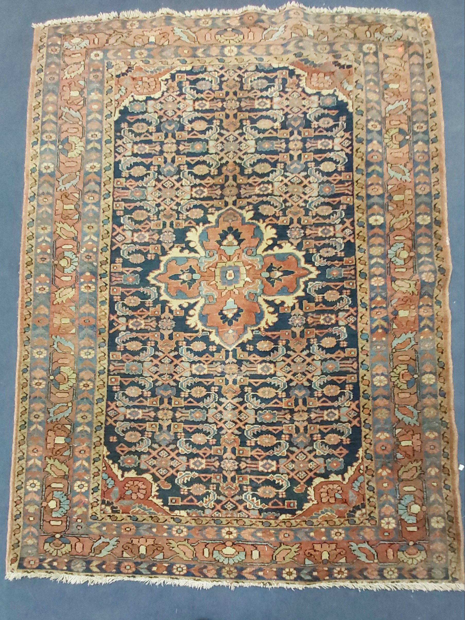 A Persian blue ground rug, 190 x 140cm